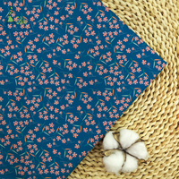 Tissu popeline 100% coton biologique peigné et tissé, imprimé de petits motifs floraux, léger et résistant aux taches, idéal pour les chemises de filles et de garçons