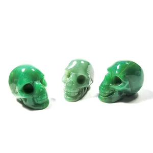 Incroyable tête de crânes en pierre de guérison d'aventurine verte naturelle sculptée de 2 pouces pour la décoration artisanale