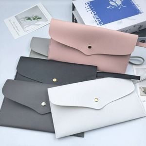 กระเป๋าใส่เครื่องสำอางแบบซองหนัง PU เรียบง่าย พกพาสะดวก พร้อมสายคล้องมือ - Product Image 3