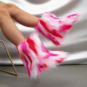 2025 fábrica al por mayor invierno mullido piel sintética mapache mujeres tacón plano manga media botas de <span class=keywords><strong>furia</strong></span> botas de nieve con piel - Product Image 1