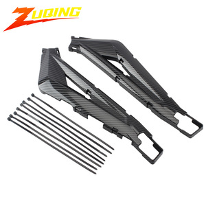 Protector de horquilla trasera de fibra de carbono Zuqing para motocicleta eléctrica Sur Ron Light Bee con accesorios de montaje - Product Image 1