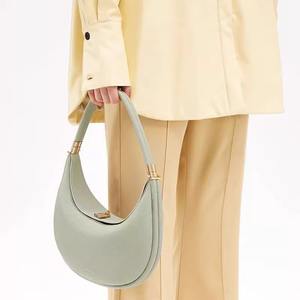 Light <b>green</b> leather crescent-shaped handbag with luxurious metal embellishments, a women's shoulder <b>bag</b>. - Product Image 4