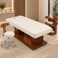Table de massage électrique professionnelle haut de gamme avec dossier réglable, cadre en bois et chauffage, idéale pour hôtels, salons et centres de bien-être