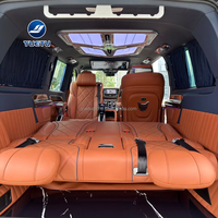 Siège de capitaine en cuir orange personnalisé, inclinable, avec repose-jambes, commande tactile, accoudoir et éclairage d'ambiance pour MPV