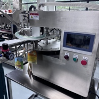 Machine de remplissage et de scellage automatique Zhongjie pour sachets à bec verseur (doypacks) pour l'emballage de liquides, sauces, beurre et pâtes (Ketchup, etc.)