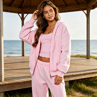 Ensemble de survêtement décontracté personnalisé en molleton de coton rose brodé avec sweat à capuche à double fermeture éclair et pantalon de survêtement pour femme