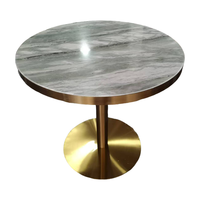 Table à manger de restaurant élégante de bonne qualité en pierre de terrazzo personnalisée en or galvanisé en acier inoxydable