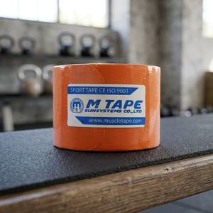 เทปพันกีฬา M Tape ขนาด 5 ซม. x 5 ม. สีส้ม แบบยืดหยุ่น ทำจากผ้าฝ้าย สำหรับป้องกันการบาดเจ็บในการเล่นกีฬา - Product Image 1