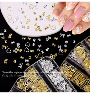Accessoires de <span class=keywords><strong>nail</strong></span> <span class=keywords><strong>art</strong></span> 3D en alliage métallique mixte à 12 compartiments, cœurs dorés et argentés, perles, strass DIY pour manucure – Vente chaude - Product Image 1