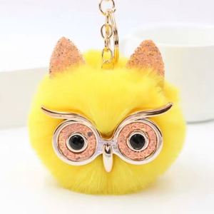Porte-clés multicolore en cuir souple avec pompon hibou brillant en cristal et yeux métalliques, idéal comme pendentif de sac - Product Image 1