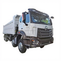 Самосвал SINO HOWO NX 8x4 для тяжелых условий эксплуатации с кузовом дугообразной формы, обеспечивающий минимальное остаток материала в кузове, для горнодобывающей промышленности