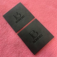 Patch en cuir noir gravé au laser avec logo en relief pour sac à dos, étiquettes en cuir à coudre pour jeans, chapeaux et sacs, prix d'usine