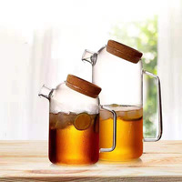 Carafe en verre borosilicate de haute qualité, design créatif et luxueux, transparente, épaissie, grande capacité, avec infuseur à thé et couvercle, pour boissons froides et chaudes, idéale pour les réceptions