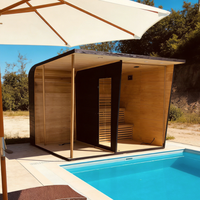 Sauna extérieur moderne en bois de cèdre noir imprimé pour 2 à 6 personnes, avec poêle à vapeur et pierres volcaniques, idéal pour villa ou parc.