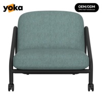 Fauteuil lounge à structure en acier avec roulettes, siège rembourré confortable, fauteuil mobile pour espaces publics et salon