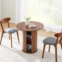 Table à manger ronde Japandi avec base cannelée et piétement de rangement, en bois de noyer, vente en gros pour importateurs, OEM ODM
