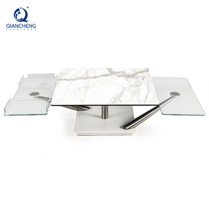 <span class=keywords><strong>Table</strong></span> <span class=keywords><strong>basse</strong></span> pivotante de style moderne en acier inoxydable avec <span class=keywords><strong>plateau</strong></span> en <span class=keywords><strong>céramique</strong></span> rotatif et dessus en verre - Product Image 1