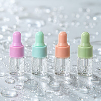 Flacon compte-gouttes en verre vide, rechargeable, transparent, avec bouchons colorés pour sérum, huile essentielle, emballage cosmétique