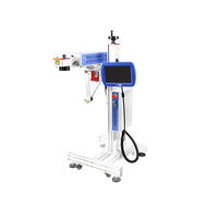 Autofocus en ligne volant 30W co2 galvo laser machine de marquage avec convoyeur pour jeans carte d'identité câble oiseau anneau stylo gravure sur bois