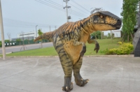 Costume réaliste de dinosaure T-rex avec pattes cachées pour spectacle sur scène, modèle animatronique de dinosaures pour amusement