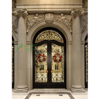 Porte d'entrée double en fer forgé avec moustiquaire et vitrage ouvert, style américain populaire