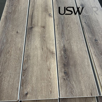 Plancher en vinyle SPC de luxe, anti-rayures, sans formaldéhyde, facile à nettoyer, antidérapant, pour les espaces commerciaux, marque privée