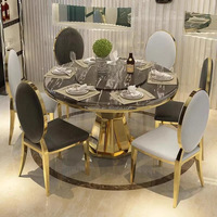 Meubles de maison Europe du Nord Ensemble de table à manger en marbre Tables de restaurant et chaises en tissu vert Tables de salle à manger rondes en métal