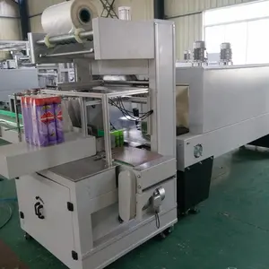 Emballage de bouteilles de boissons à eau Boîtes de pulvérisation <span class=keywords><strong>Machine</strong></span> d'emballage automatique de film rétractable en L - Product Image 1