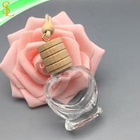 Bouteille diffuseur de parfum d'huiles essentielles pour voiture, vide, en verre transparent en forme de cœur, 12 ml, à suspendre, avec bouchon à vis et corde, design givré