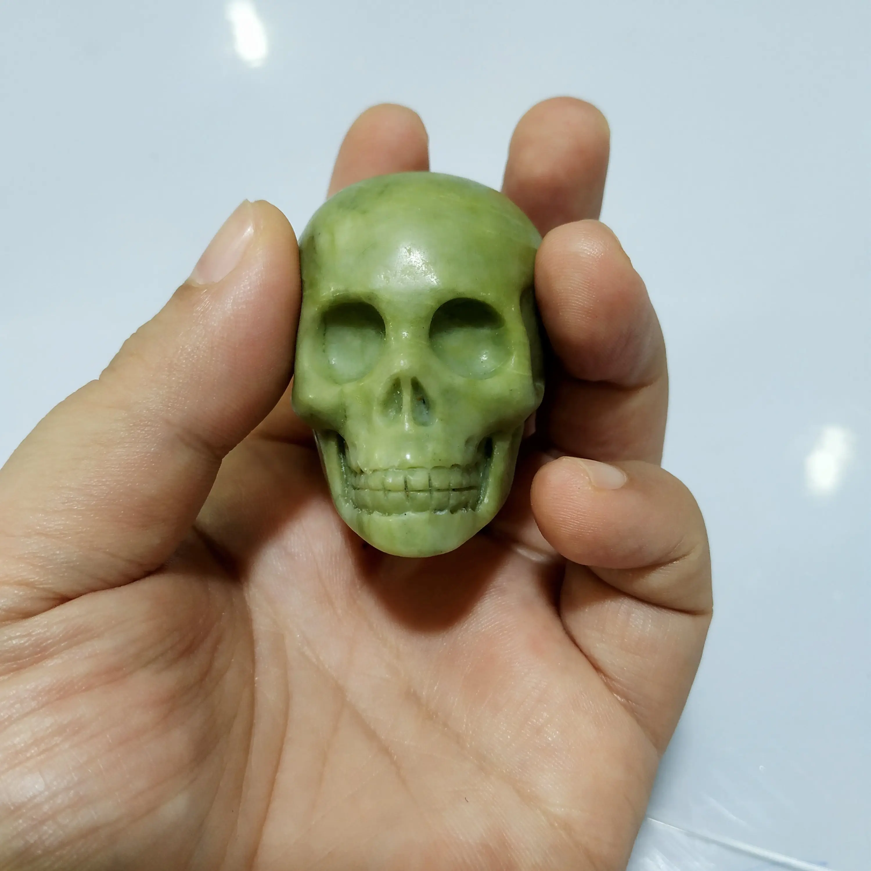 natural gemstone display craft decor south green jade carved skulls