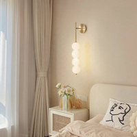 Lampe murale moderne nordique en fer avec bande LED et lumière chaude pour la décoration de la chambre à coucher et du salon