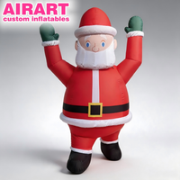 Père Noël gonflable sur pied aux bras levés, ventre proéminent, personnalisé et amusant pour les fêtes de Noël