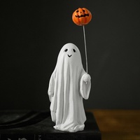 Figurine en résine de personnage de dessin animé en robe blanche tenant un ballon citrouille pour la décoration intérieure