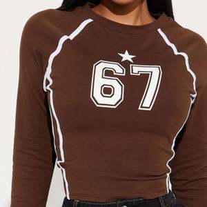 Novedad de 2025, Top de manga larga con estampado Simple Retro elástico deportivo a la moda callejera europea y americana transfronteriza para mujer - Product Image 3