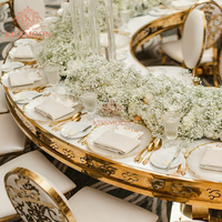 Table de banquet moderne de luxe en acier inoxydable, table de mariage en forme de papillon dorée serpentine pour événement