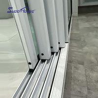 Porte coulissante multi-voies anti-effraction avec verre réfléchissant pour intimité, poignée en D, design anti-pincement, idéale pour salon et balcon