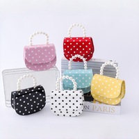 Nouveau sac d'été pour enfants en PU imperméable avec nœud papillon, mini porte-monnaie tendance, sac mignon de style occidental