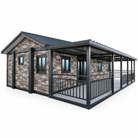 Maison modulaire préfabriquée moderne avec revêtement mural en pierre et terrasse couverte pour lieu de mariage, jardin ou espace événementiel