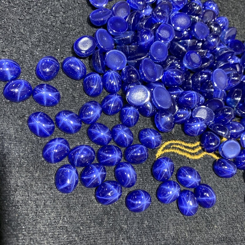 Fantezi taşlar Oval düz yıldız safir Cabochon mavi safir yıldız taş