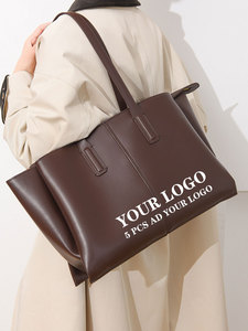 <span class=keywords><strong>Sac</strong></span> fourre-tout en PU <span class=keywords><strong>marron</strong></span> grande capacité avec logo personnalisé 2026, <span class=keywords><strong>sac</strong></span> à bandoulière décontracté et imperméable pour femme - Product Image 1