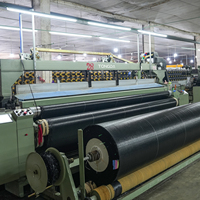 TONGDA TD908 Métier à tisser à jet d'eau industriel pour tissu anti-herbe en PP et PE, production de géotextiles et de bâches robustes, haute productivité
