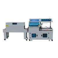 Machine d'emballage sous film rétractable en L entièrement automatique pour boîtes