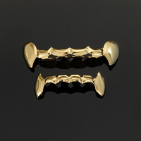 Grillz unisexe en cuivre doré style dent de vampire, modèle Xuanlian 4534, tendance Europe-Amérique, hip-hop, Halloween, style géométrique, à succès