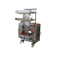 Machine d'emballage automatique à alimentation manuelle YAOMATEC modèle 550 pour le thé, les aliments, les pièces et accessoires, équipée d'une imprimante à jet d'encre.