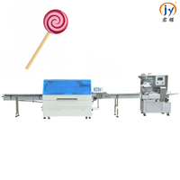 Machine avancée d'insertion de bâtonnets de sucettes, entièrement servo-électrique et à mouvement alternatif