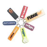 Extracteur de fermeture éclair en caoutchouc/silicone/PVC souple de haute qualité avec logo personnalisé, languette zippée avec cordon noir pour vêtements et sacs