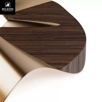 Table basse de luxe abstraite en forme de vague, moderne, en acier inoxydable doré poli, table centrale irrégulière pour la décoration du salon de villa