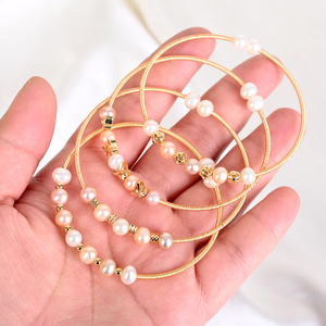 กำไลข้อมือแฟชั่นลดราคาสุดฮอต ประดับมุกธรรมชาติพันด้วยลวดทอง - Product Image 4