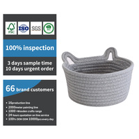 Panier de rangement rond en corde de coton gris tressé avec poignées en forme d'oreilles de chat pour organiser les petits objets sur le bureau