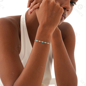 <span class=keywords><strong>Bracciale</strong></span> Gemnel in <span class=keywords><strong>Turchese</strong></span> Naturale con Argento 925 <span class=keywords><strong>e</strong></span> Finitura Dorata, Incastonato su Catena Cubana per un Stile Blu Sereno da Donna - Product Image 2